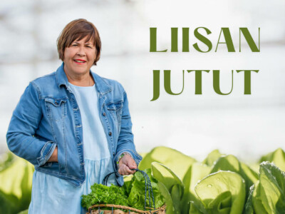 Kuvassa on hymyilevä Liisa Lindroth salaattikorin kanssa.